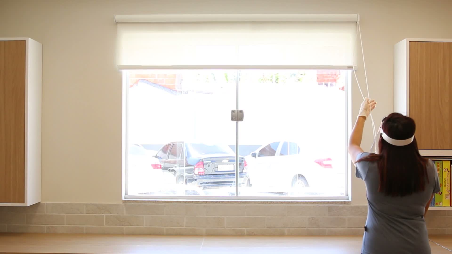 Stock inspiration: a roller blind being opened in a bright kitchen